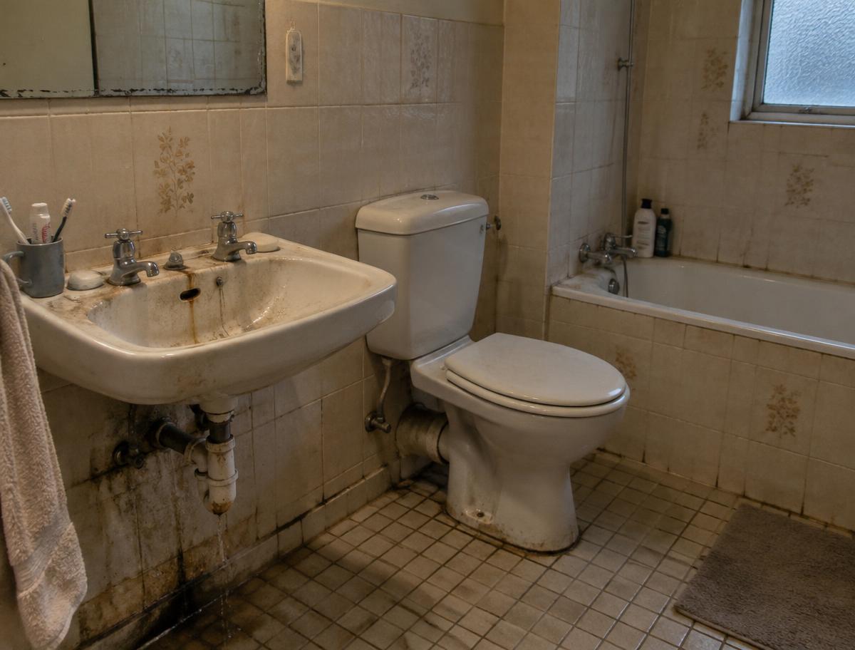 Bathroom plumbing renovation — before